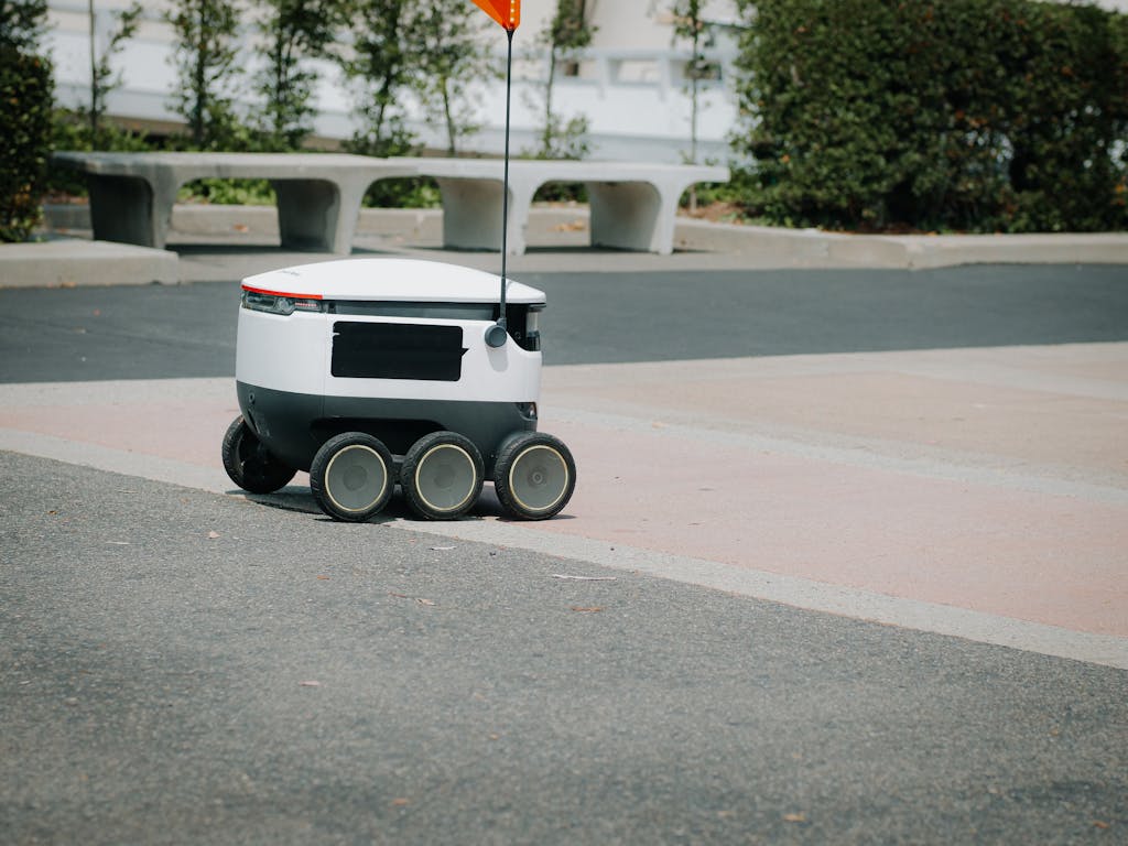 A modern autonomous delivery robot navigating an urban environment. Innovative technology for food delivery.