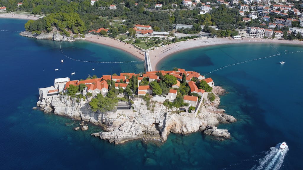 Discover the stunning aerial view of Sveti Stefan, Montenegro's iconic island resort.